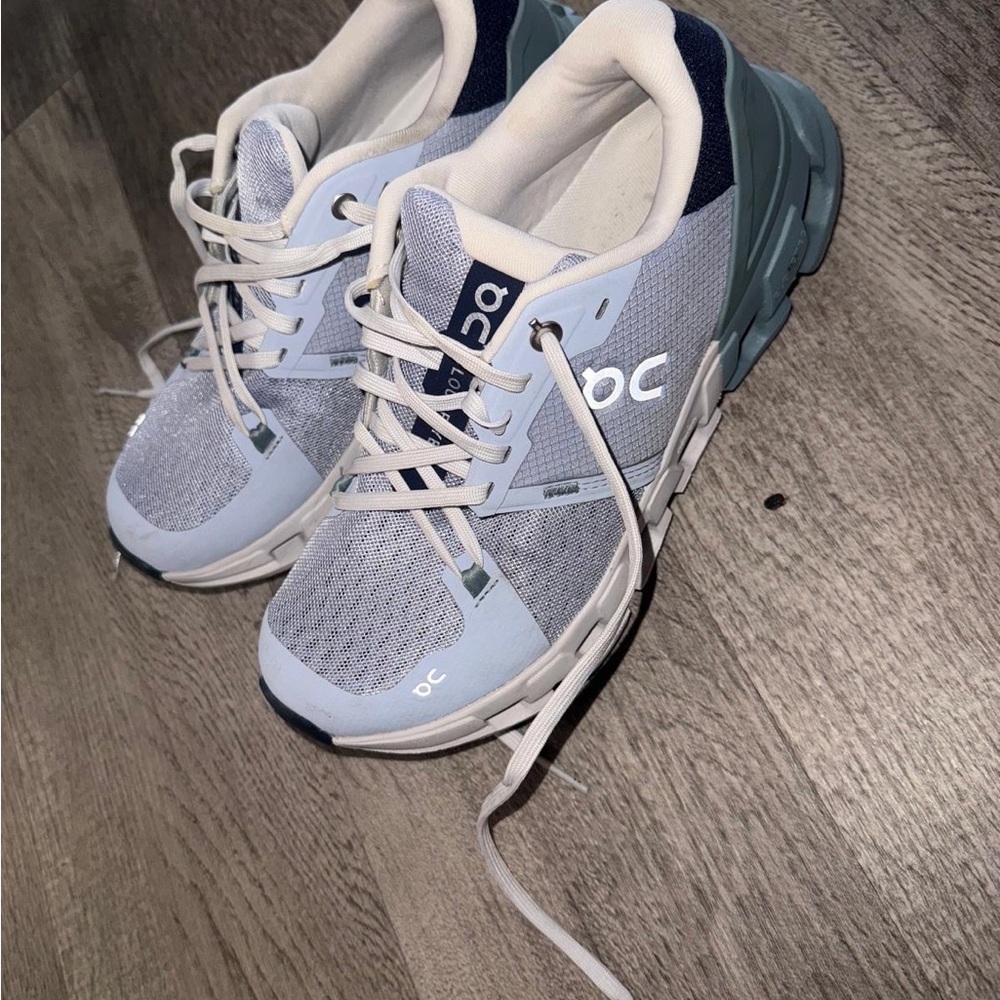 On Running Light Gray and White Athletic Shoes